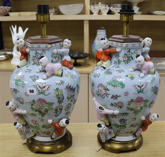 A pair of Chinese famille rose vases now converted to lamps height 40cm